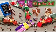 Elf on the Shelf - Green Prankster Elf Rides the Train Again! Did Gingerbread Man Make Him Do it???