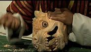 Carving of the famous Bhutanese mask