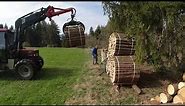 Holz Bündeln und spalten Case IH 940 mit Fortszange. Splitting wood using a loader and bale firewood