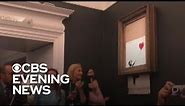 Banksy painting self destructs after $1.4 million sale