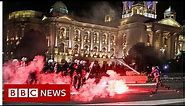 Coronavirus: Belgrade protesters storm Serb parliament over curfew - BBC News