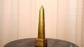Temple of Ra Gold Colored Luxor Obelisk With Hieroglyphs