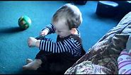 Toddler / Baby learning to put socks on
