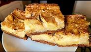 Apple Cinnamon Ooey Gooey Cake | A flat dense spice cake with an apple cinnamon cream cheese topping