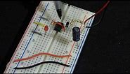 555 timer electronics astable mode circuit step by step build demonstration by electronzap