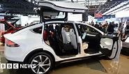 Tesla unveils Model X car with Falcon Wing doors