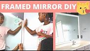How We Framed Our Large Bathroom Mirror (WITHOUT GLUE!) | DIY Power Couple