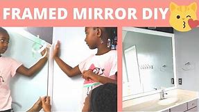 How We Framed Our Large Bathroom Mirror (WITHOUT GLUE!) | DIY Power Couple