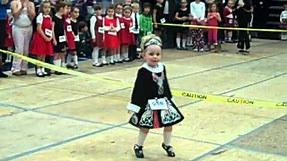 1st feis with her irish dance dress age 3