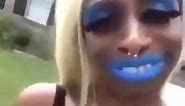 Black lady speaks gibberish with blue lipstick