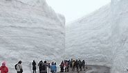 Route through towering 'snow corridor' opens in Japanese mountains