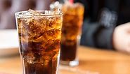 Warning Signs You're Drinking Too Much Soda, According to the Mayo Clinic