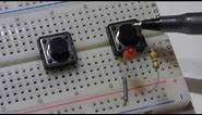 Normally open tactile push button switch. How to insert into breadboard and use in an LED circuit.