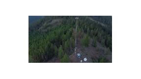 Radio Communications Cell Tower Transmitter on a Remote Mountain....