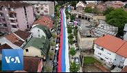 Aerial View of Serbian Flag at Kosovo Protest | VOA News