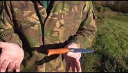 Opinel folding knife review and hard use bushcraft test. Thatched survival shelter build.