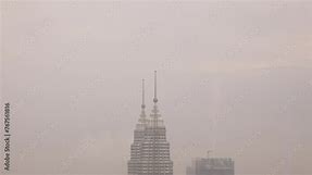 View of the Petronas Twin Towers, the tallest twin buildings in the world in Kuala Lumpur, Malaysia skyline