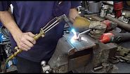 Bending A Stainless Exhaust Hanger With Torch And Custom Jig