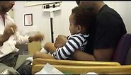 Baby laughing while getting shots