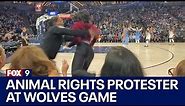 Video of animal rights protester entering Timberwolves court, getting tackled by security | FOX 9