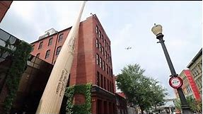 The World's Largest Bat and the World's Largest Bat - Louisville Slugger Factory and Caufields