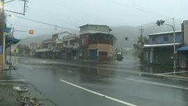 Strong winds and rain batter southern Taiwan as Typhoon Koinu nears | AFP