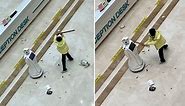 Moment woman flips out at robot ‘receptionist’ & smashes it with plank of wood