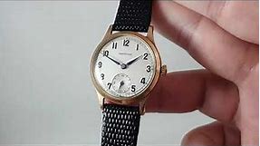 1962 Garrard men's vintage gold watch presented by Dunlop.