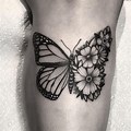 Butterfly Tattoo with Half Flowers