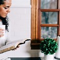 Woman Reading Bible and Drinking Coffee