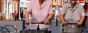 Elderly People with Shopping Trolley