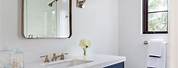 Navy Bathroom with Beige Floor Tiles