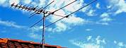 TV Antenna On Old House Roof