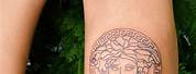 Versace Lion Logo Tattoo