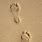 Footprints On Sand