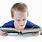 Image of a Boy Reading a Book