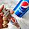 Syringe in Pepsi