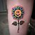 Smiley-Face Flower Tattoo
