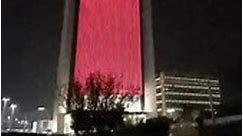 the ADNOC headquarters in Abu Dhabi were lit up in red