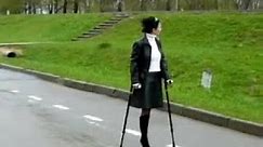 Oldies Amputee woman crutching