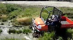 Video of Kubota RTV900 Turbo, With Soucy Tracks up the Creek