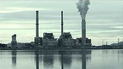 Royalty Free HD Stock Footage Coal Plant Polution Emissions Smokestack Water Factory