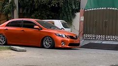 Toyota Corolla Gli Orange Wrapped 🧡 | E140 Fully Deaddropped Static without Springs | #its_daniyal_squad #toyotacorolla #modified #deaddropped #airsuspension #camber | Its Daniyal Squad