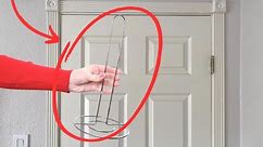 Stick a paper towel holder on your door (BRILLIANT!)