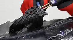 Headlight tab repair using the nitrogen plastic welder and Tab Magic Molding Putty. The Tab Magic retains the fine details of the waffles on the tab. | Polyvance