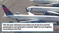 Delta plane's emergency slide falls off during flight