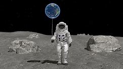 Atsronaut with a ball in the shape of the Earth is walking on the moon. Elements of this video furnished by NASA. 3d rendering.