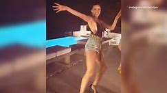 Olivia Culpo shows off her legs in sexy 'Daisy Duke'-style shorts while dancing