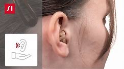 How to put on a Signia ITE (in-the-ear) hearing aid | Signia Hearing Aids