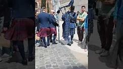 Piper & kilties marching through Rome - pipe major Nick MacVicar